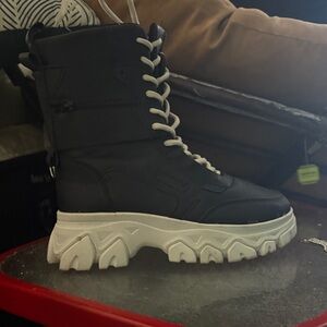 Black High-Top Boots with White Soles